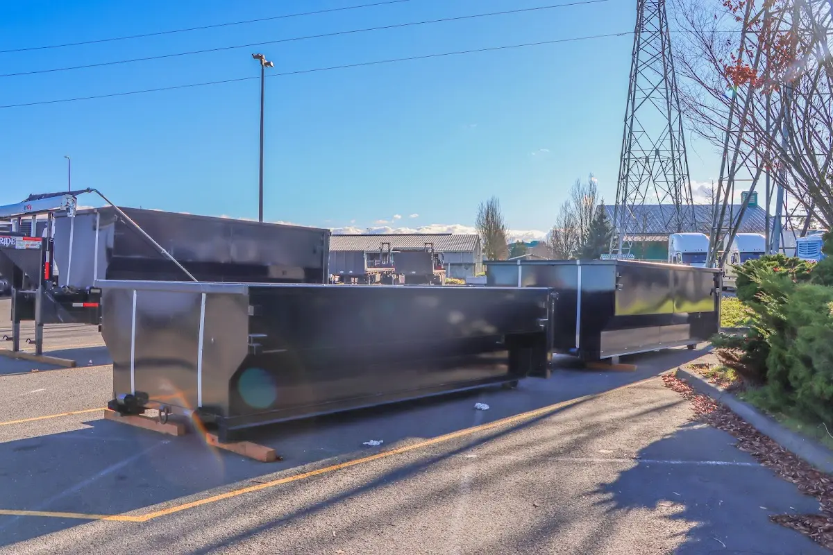 Roll-off dumpster ready for waste disposal at job site for Yard Waste Dumpster Rental in Old Forge